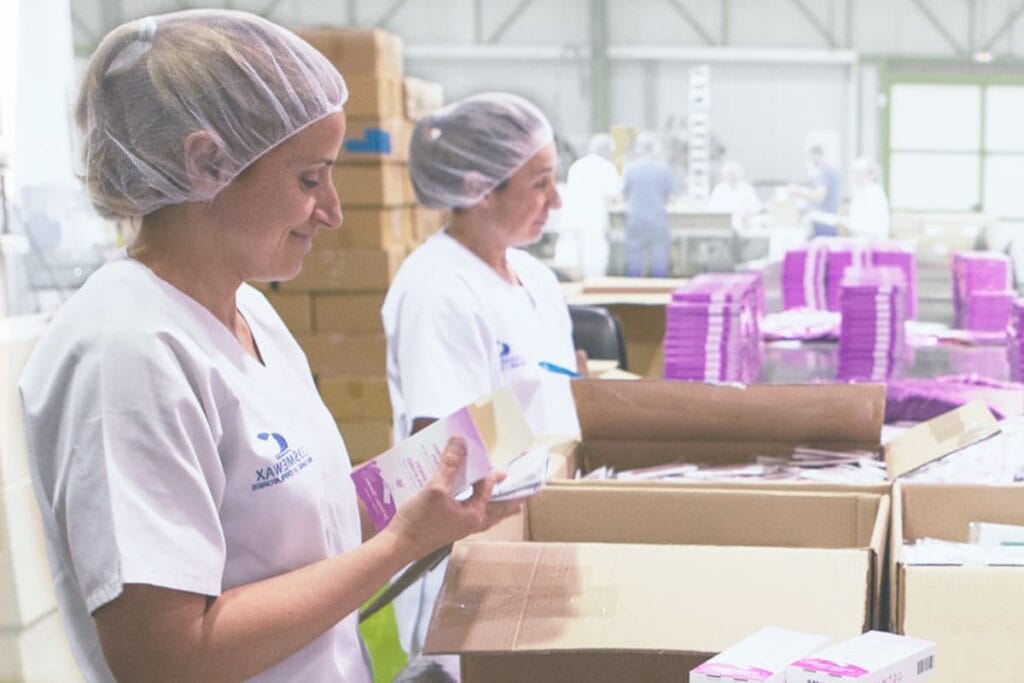 Cosmetics manufacturing team working in production facilities