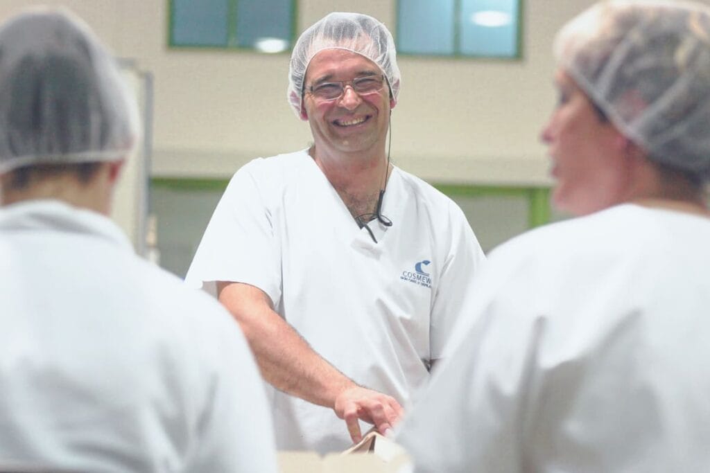 Committed professionals in cosmetic manufacturing operations